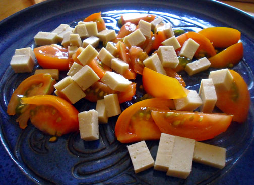 Dairy-free, gluten-free, soy-free cheese with garden tomatoes